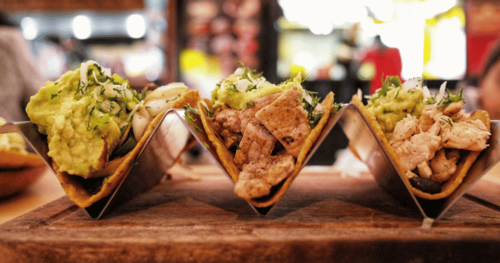 chicken tacos with guacamole and herbs