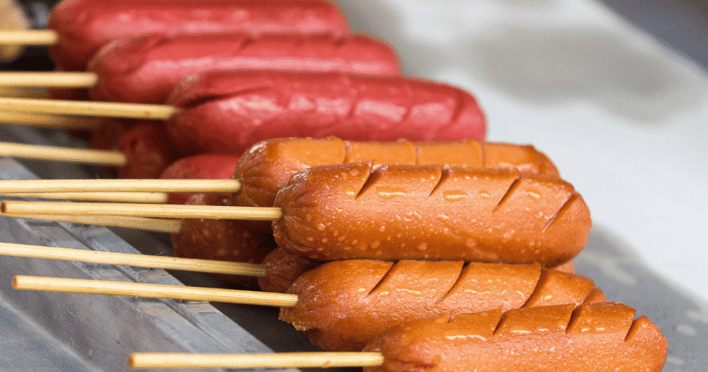 hotdogs placed on trays for sale